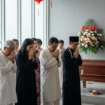 Diverse cultural funeral services in Singapore showing shared grief and respect