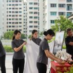 Funeral services Singapore professionals setting up a wake, demonstrating mastery of logistics and empathy.