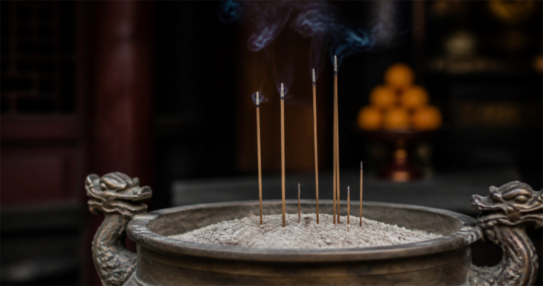 Incense burning in a bronze urn during Chinese mourning observances